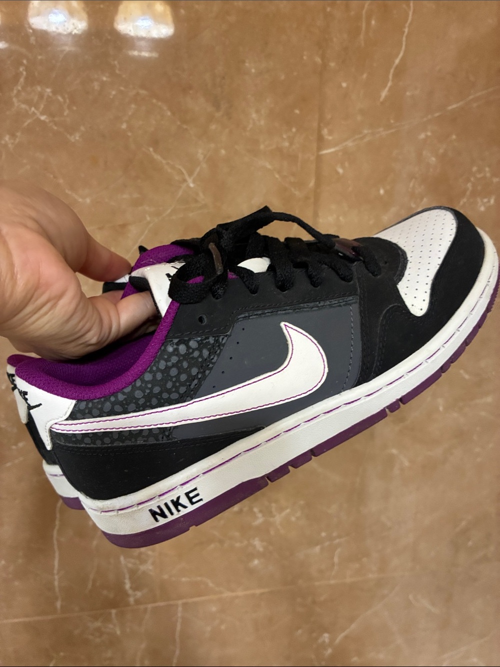 Nike Low Top Sneakers in Black, White & Purple Accent